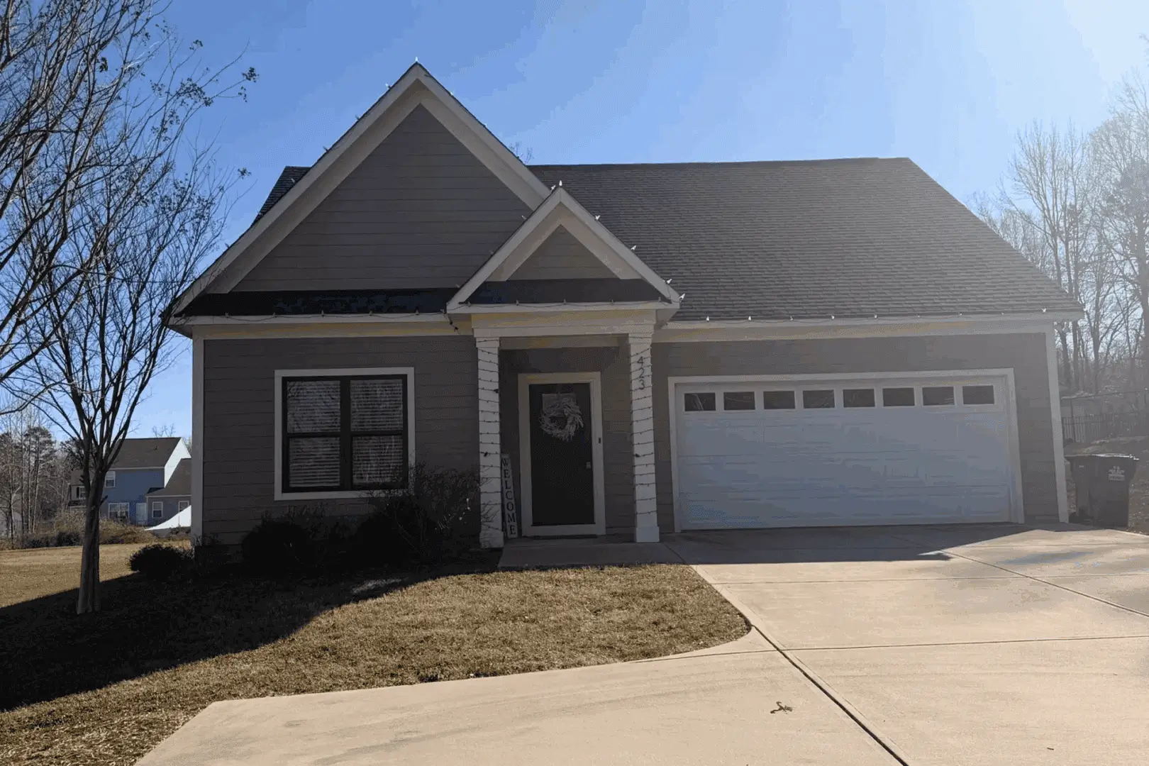 Single-story house with garage and driveway